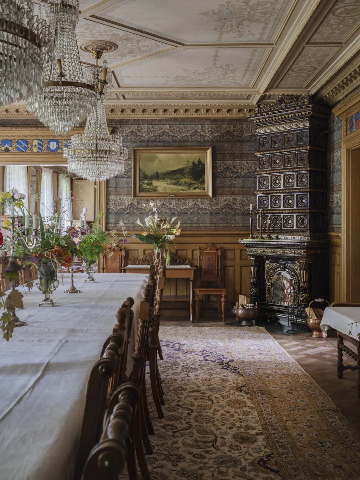 Dining area, stove, brass firewood holders