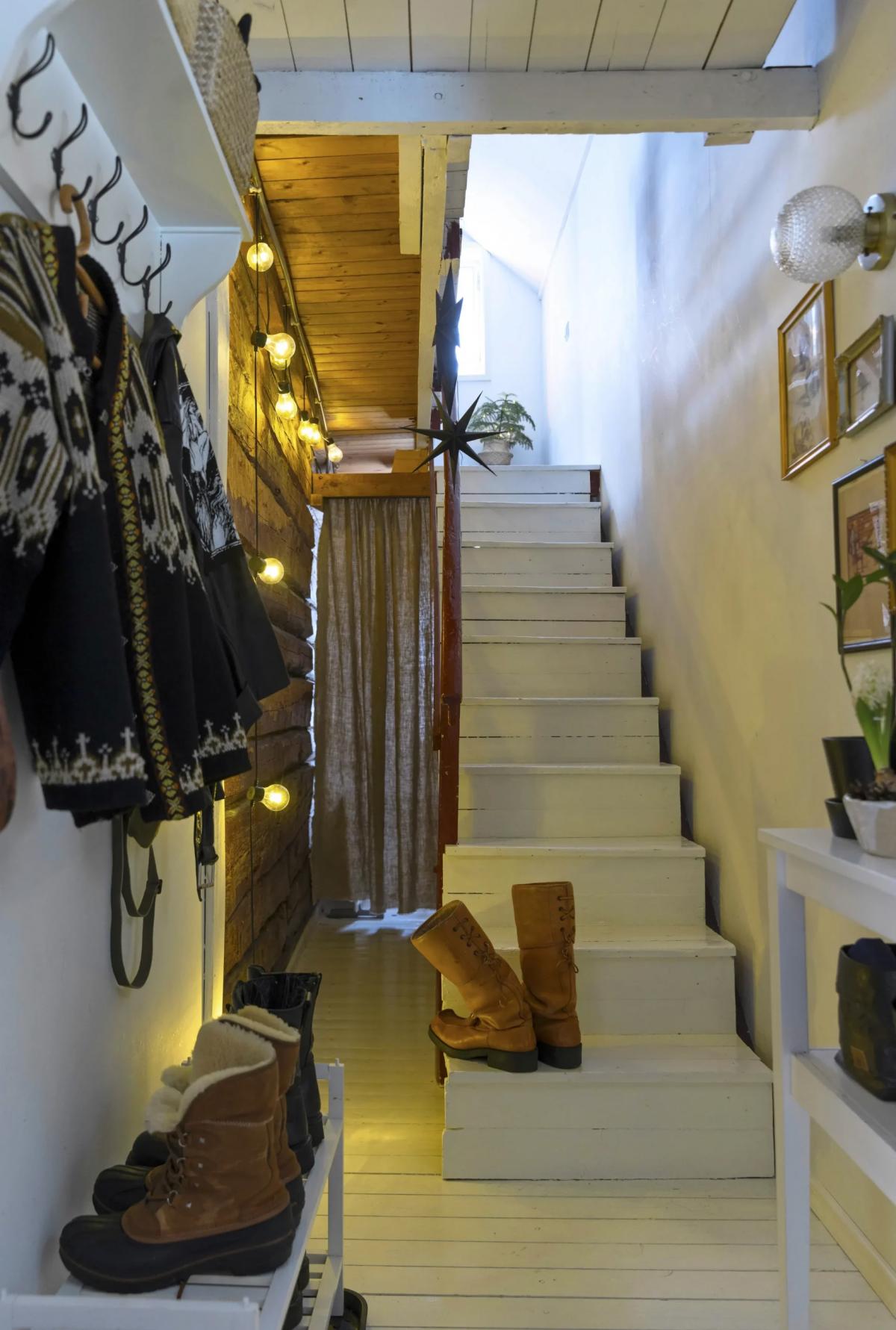 Wooden white staircase in a Finnish house