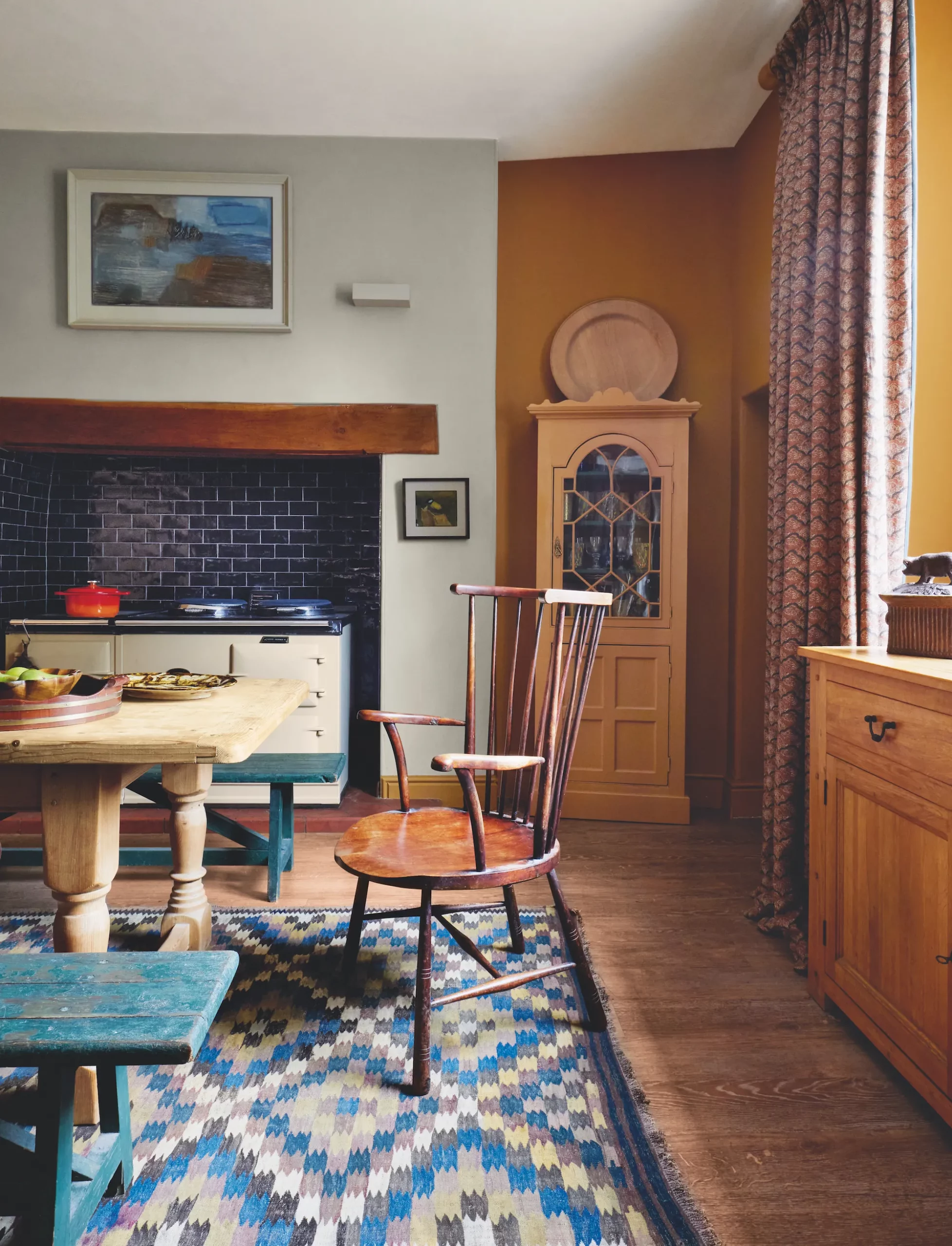 Dining area and old AGA stove in an English house