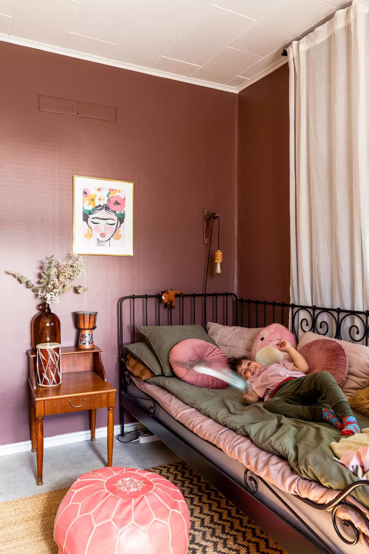 Bedroom in a Finnish house with warm decor