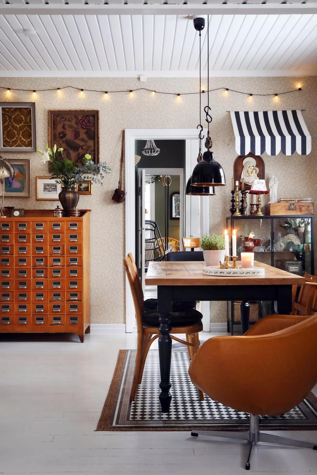 Dining area with a vintage leather armchair from a flea market